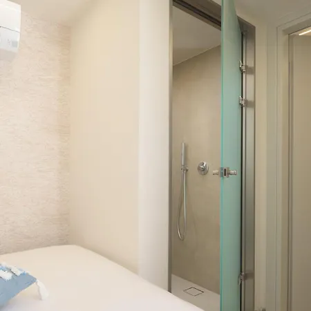 Infinity Suites, By Hellocrete Apartment